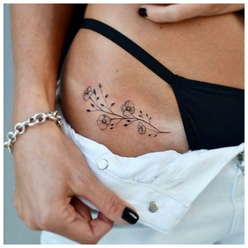 Hip Flower Tattoo